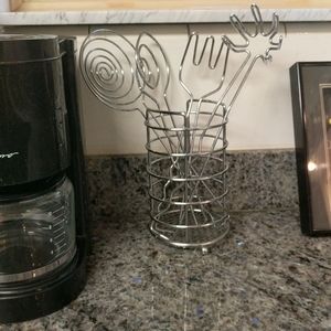 Kitchen utensils that can be decorative or used to serve.  Pasta fork, etc.
